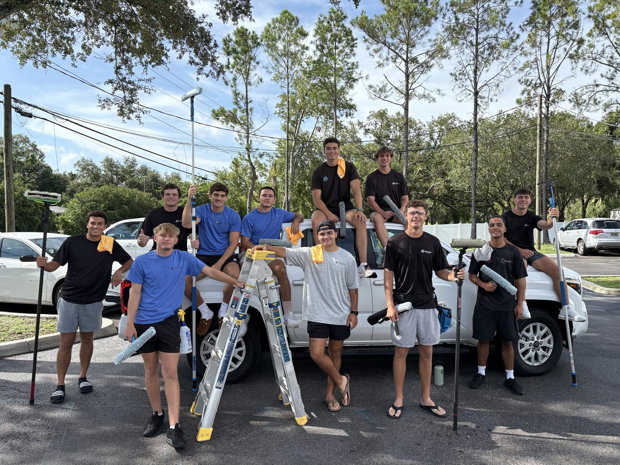 The Fresh Frames crew with their equipment, ready to clean a Florida home